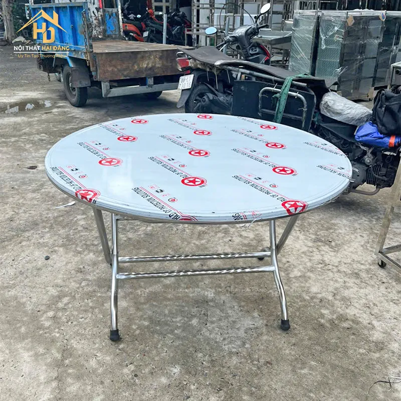 Bàn tròn inox gấp gọn tiện lợi