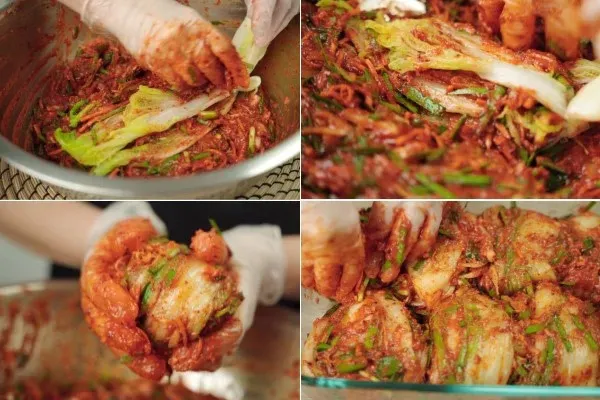 Thoa sốt vào từng lá cải thảo theo đúng cách làm kim chi Hàn Quốc