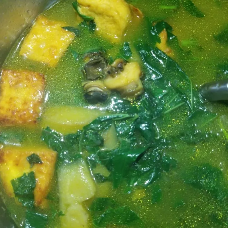 Hầm chuối và đậu hũ cho đến khi chín mềm và thấm vị